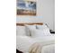 Comfortable bedroom featuring white bedding, a wood headboard and a mountain view at 1 N Pearl St # 201, Denver, CO 80203
