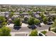 Aerial view of the neighborhood showing mature trees and well-maintained homes at 11842 Altura St, Commerce City, CO 80603
