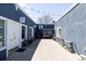 Charming outdoor courtyard featuring inviting cafe seating and string lights perfect for relaxing or socializing at 1021 Carr St # 17, Lakewood, CO 80214