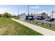 Modern commercial building exterior with walking path access, ample parking, and green spaces at 1021 Carr St # 17, Lakewood, CO 80214
