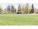 View of park amenities including shelter and grass play area at 1021 Carr St # 17, Lakewood, CO 80214
