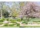 Scenic park view with lush landscaping and mature trees in full bloom for a serene outdoor experience at 1021 Carr St # 17, Lakewood, CO 80214