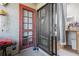 Back patio with screen door, access to the kitchen and covered at 1021 Carr St # 17, Lakewood, CO 80214