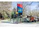 View of the colorful community playground with castle and slides at 1021 Carr St # 17, Lakewood, CO 80214