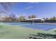 Well-maintained outdoor tennis courts with vibrant blue and green surfaces ready for recreational play at 1021 Carr St # 17, Lakewood, CO 80214