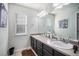 Clean bathroom with double sinks and modern vanity at 4357 Ivycrest Pt, Highlands Ranch, CO 80130