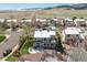 Aerial view of the home showcasing the backyard, patio, and surrounding neighborhood at 9407 W Gibraltar Pl, Littleton, CO 80127
