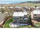 This home boasts an outdoor patio, landscaping, and a well-manicured lawn at 9407 W Gibraltar Pl, Littleton, CO 80127
