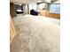 Large basement space with carpeting, a window, and access to another room at 5343 S Ukraine Way, Aurora, CO 80015