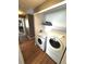 Convenient laundry area with modern washer and dryer appliances at 5343 S Ukraine Way, Aurora, CO 80015