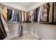 Well-organized walk-in closet with ample hanging space and shelving at 1933 W 165Th Way, Broomfield, CO 80023