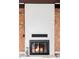 Close-up of a charming fireplace in a home featuring exposed brick, white paint, and rustic charm at 2340 Jamaica St, Aurora, CO 80010