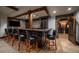 Finished basement with a bar and wine cellar access at 662 Yankakee, Castle Rock, CO 80108