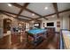 Finished basement with pool table, shuffleboard and bar at 662 Yankakee, Castle Rock, CO 80108