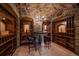 Custom wine cellar with stone walls and ample storage at 662 Yankakee, Castle Rock, CO 80108