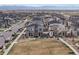 Expansive aerial view of a modern housing community with mountain views at 24333 E 41St Ave, Aurora, CO 80019