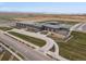Aerial view of the community school building with playground and athletic fields at 24333 E 41St Ave, Aurora, CO 80019