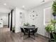 Cozy dining area with a round table, modern decor, and bright natural light at 24333 E 41St Ave, Aurora, CO 80019