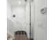 Bright entryway with wood floors, white walls, and access to the stairs at 24333 E 41St Ave, Aurora, CO 80019