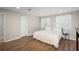 Bright bedroom featuring wood flooring and large windows at 12281 E Tennessee Dr # 303, Aurora, CO 80012