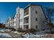 The building exterior features multiple balconies at 12281 E Tennessee Dr # 303, Aurora, CO 80012