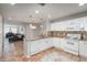 Spacious kitchen with stainless steel appliances, granite countertops, and open view to the living area at 12281 E Tennessee Dr # 303, Aurora, CO 80012