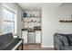 Cozy living area featuring a bar area and comfortable seating at 12281 E Tennessee Dr # 303, Aurora, CO 80012