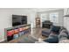 Cozy living area with contemporary furnishings and beautiful hardwood floors at 12281 E Tennessee Dr # 303, Aurora, CO 80012