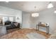 Comfortable living space with hardwood floors, modern furnishings, and abundant natural light at 12281 E Tennessee Dr # 303, Aurora, CO 80012