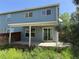 The backyard includes a patio area and some landscaping, providing a versatile outdoor space at 897 Mockingbird Ln, Brighton, CO 80601
