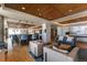 Bright common area with a bar, lounge seating, and elegant finishes in Denver at 1750 Wewatta St # 705, Denver, CO 80202