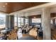 Stylish common area featuring comfortable seating, a fireplace, and city views at 1750 Wewatta St # 705, Denver, CO 80202