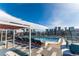 Rooftop pool featuring an outdoor pool deck with lounge seating and a stunning city skyline backdrop at 1750 Wewatta St # 705, Denver, CO 80202