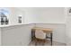 Bright office nook with small desk, chair and two windows at 1678 Wright Aly, Erie, CO 80516