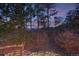 Picturesque view of backyard surrounded by trees and landscape at 17015 Oxbridge Rd, Monument, CO 80132