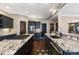 Kitchen featuring granite countertops and dark wood cabinets at 17015 Oxbridge Rd, Monument, CO 80132