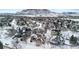 Aerial view of a residential neighborhood in winter at 17364 W 63Rd Dr, Arvada, CO 80403