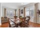 Dining area with hardwood floors and view to living room at 17364 W 63Rd Dr, Arvada, CO 80403