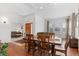 Dining room with hardwood floors and access to living room at 17364 W 63Rd Dr, Arvada, CO 80403