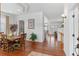 Bright dining room with hardwood floors and view to living room at 17364 W 63Rd Dr, Arvada, CO 80403