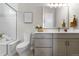 Modern bathroom with a white countertop, grey cabinets, and a glass enclosed shower at 890 Coal Bank Trl, Castle Rock, CO 80104