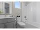 Bright bathroom with a white tub, modern vanity, and a clean, functional design at 890 Coal Bank Trl, Castle Rock, CO 80104