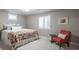 Comfortable bedroom with neutral walls, window with shutters, and stylish decor at 5164 E Princeton Ave, Cherry Hills Village, CO 80113
