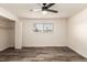 Well-lit bedroom with wood-look floors and closet at 50 E Highline Cir # 102, Centennial, CO 80122