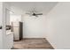 Simple dining area with wood-look floors and ceiling fan at 50 E Highline Cir # 102, Centennial, CO 80122