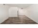 Bright living room with wood-look floors and ceiling fan at 50 E Highline Cir # 102, Centennial, CO 80122