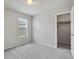 Light-filled bedroom with carpet, a closet and a bright window, offering comfort and style in a serene setting at 4770 N Jasper St, Denver, CO 80239