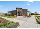 The community center building featuring modern architecture and inviting landscaping at 4770 N Jasper St, Denver, CO 80239
