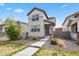 Charming two-story home with landscaped front yard and modern neutral color scheme at 4770 N Jasper St, Denver, CO 80239