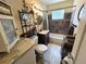 Compact bathroom featuring a tiled shower, modern vanity, and stylish fixtures; ideal for a guest bathroom at 1245 S Forest St, Denver, CO 80246